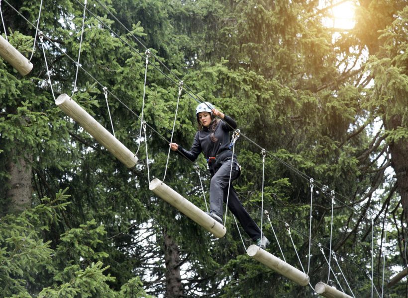 Teenage girl on high rope course